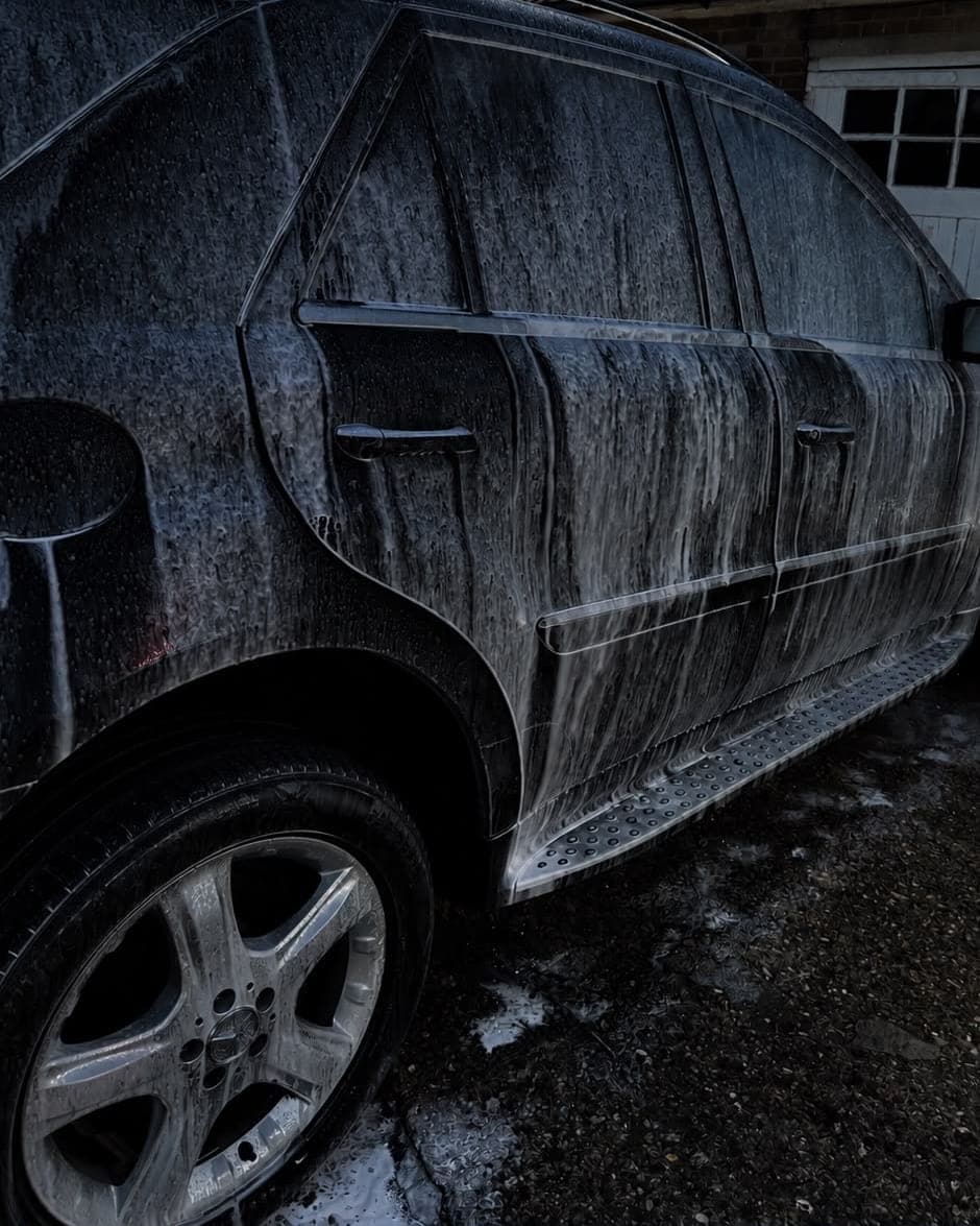 Mercedes ML covered in snow foam during an exterior valet