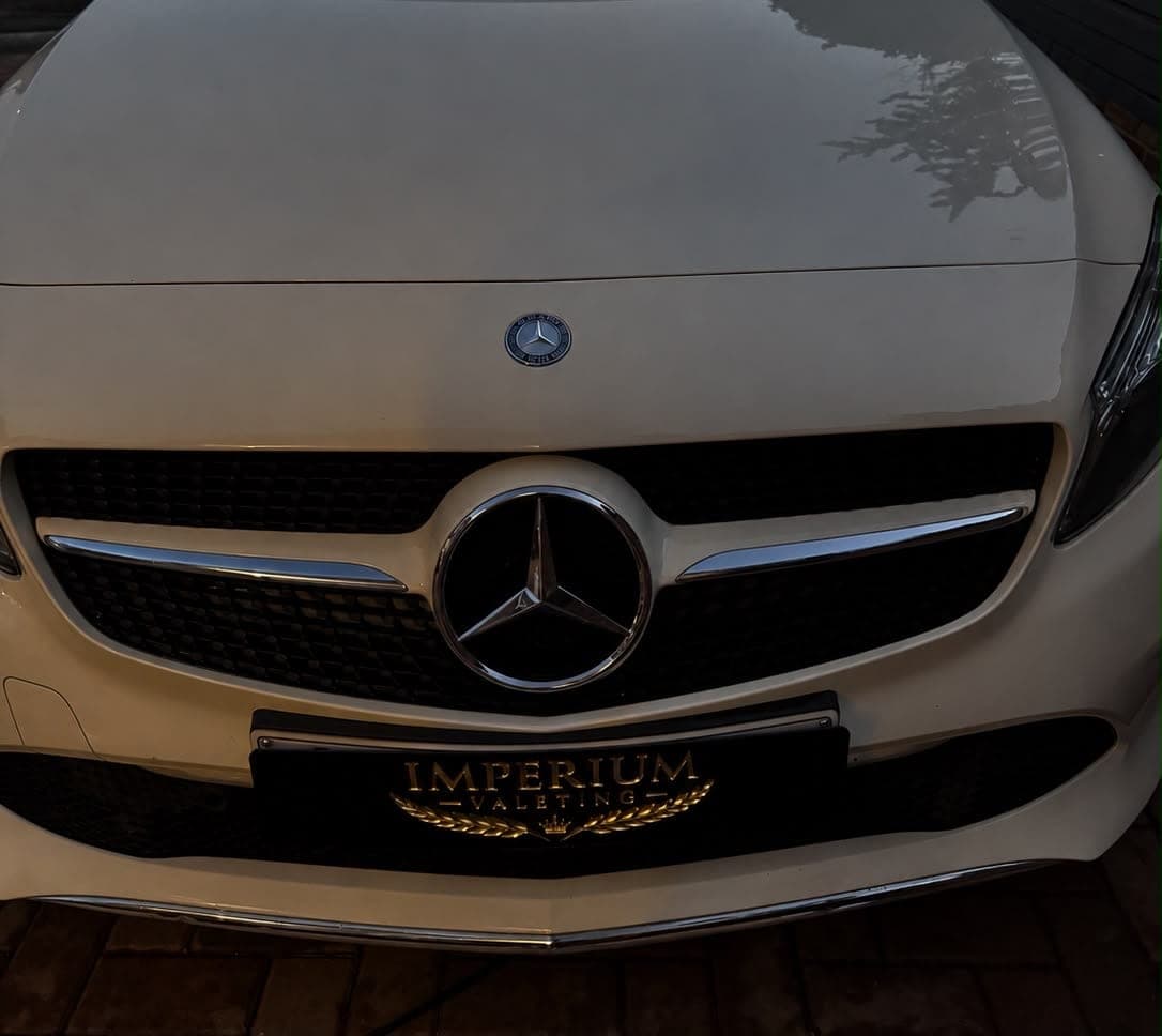 White Mercedes A-Class wearing an Imperium Valeting show plate